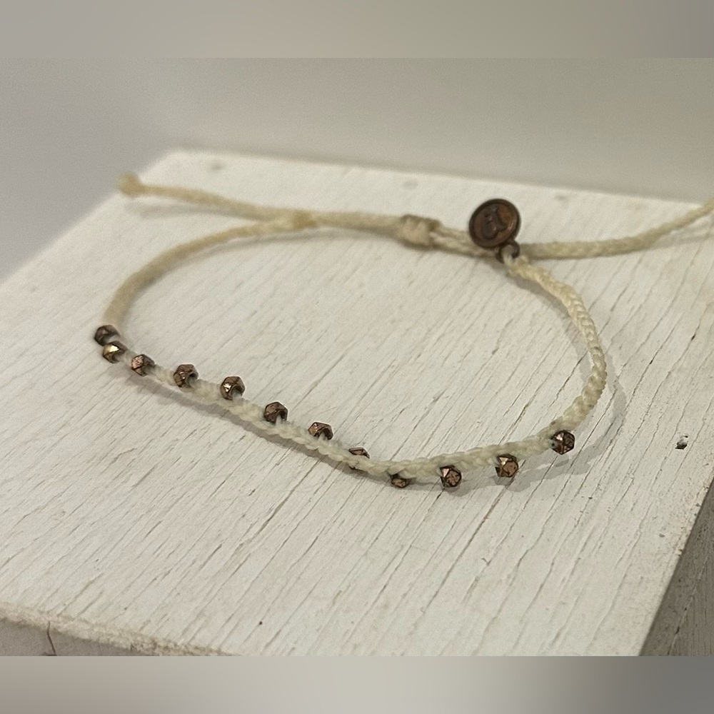 Pura Vida Solid Off-White Braided Rope Band with Dangling Copper Balls